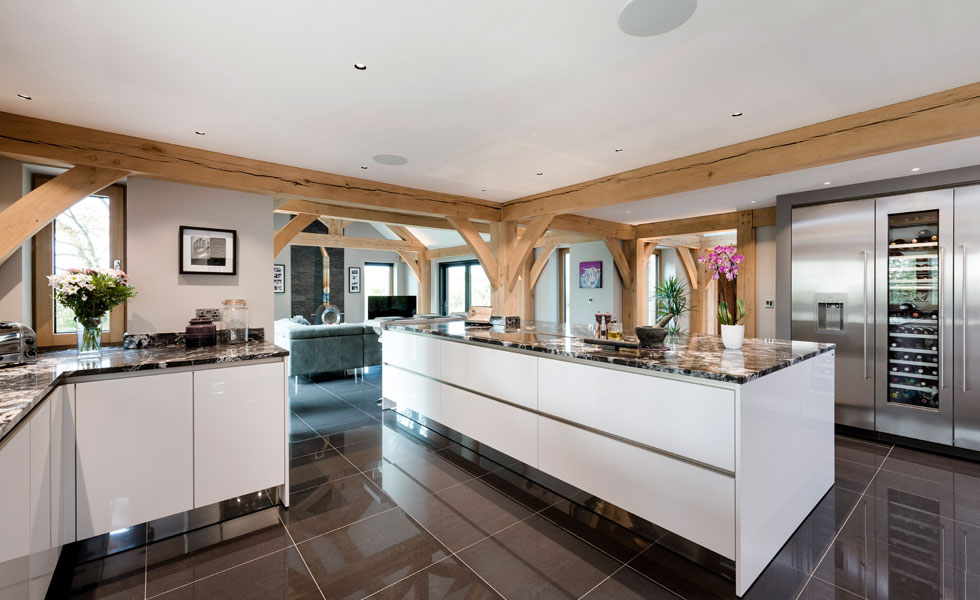 contemporary kitchen with exposed oak beams