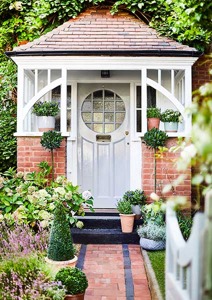 Porch with hanging basket and old door