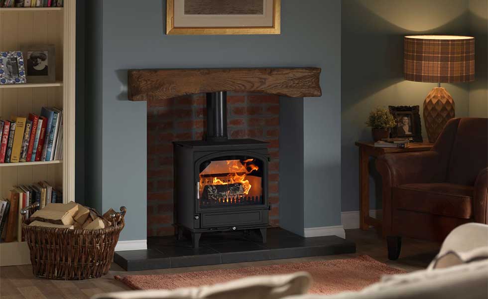Woodburning stove in inglenook fireplace