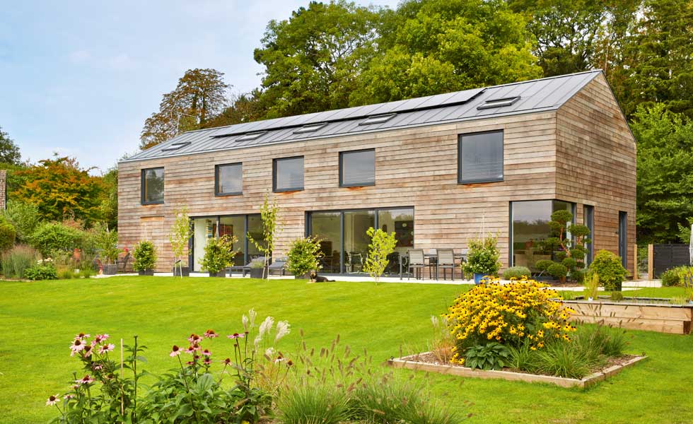 The rear elevation of the timber frame home