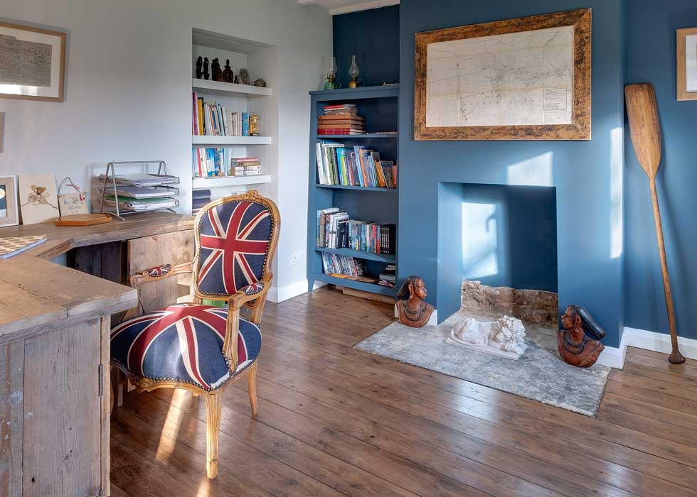 home office with blue walls and union jack chair