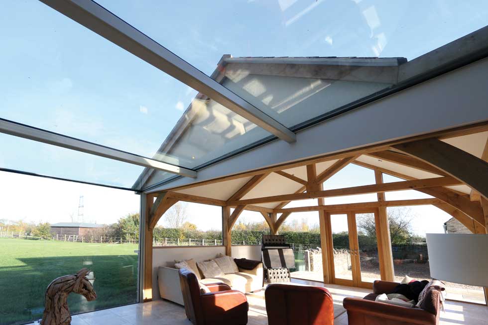 connecting the sunroom to the main house via a glazed link