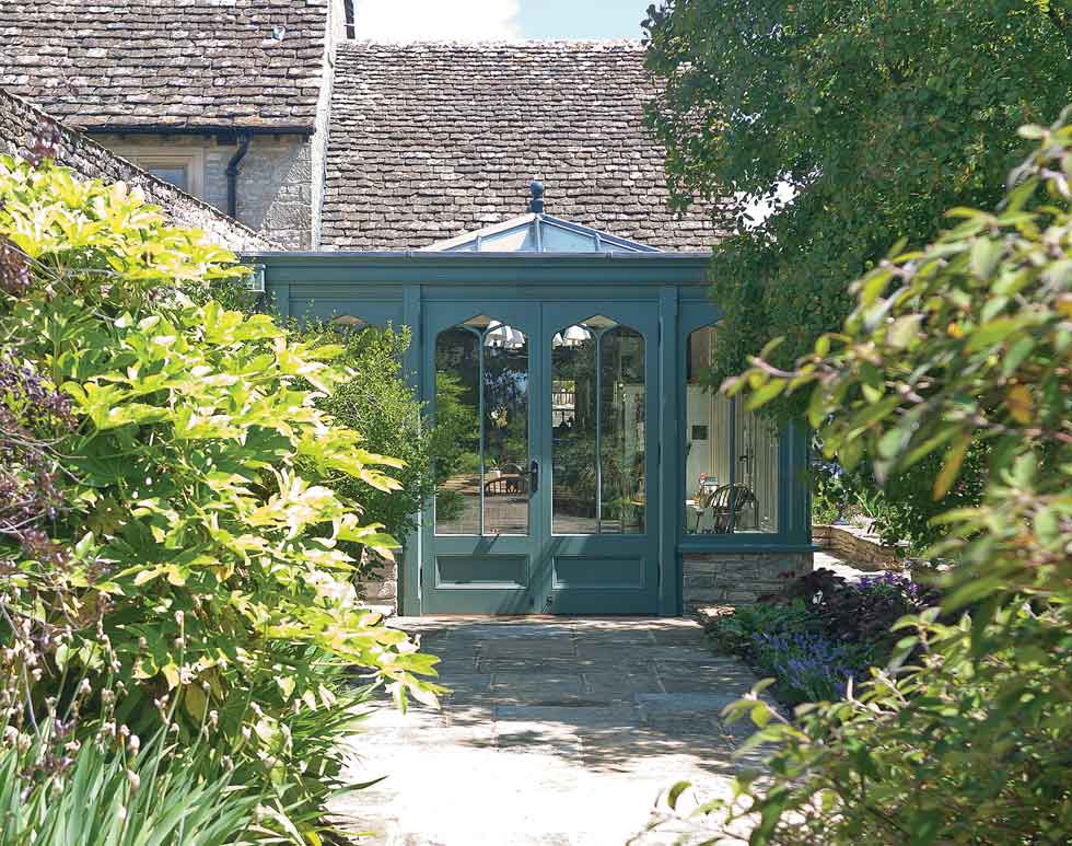 characterful patio doors from sunroom to garden