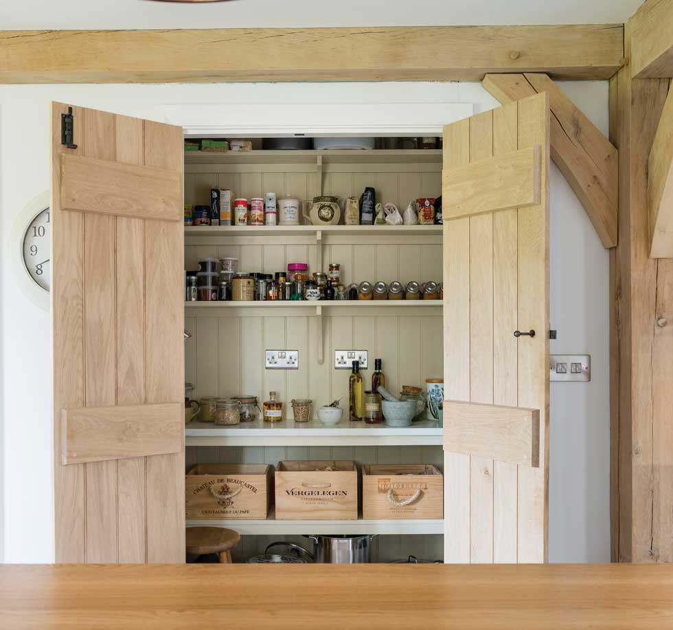 Incorporate a pantry to keep food and appliances hidden behind closed doors