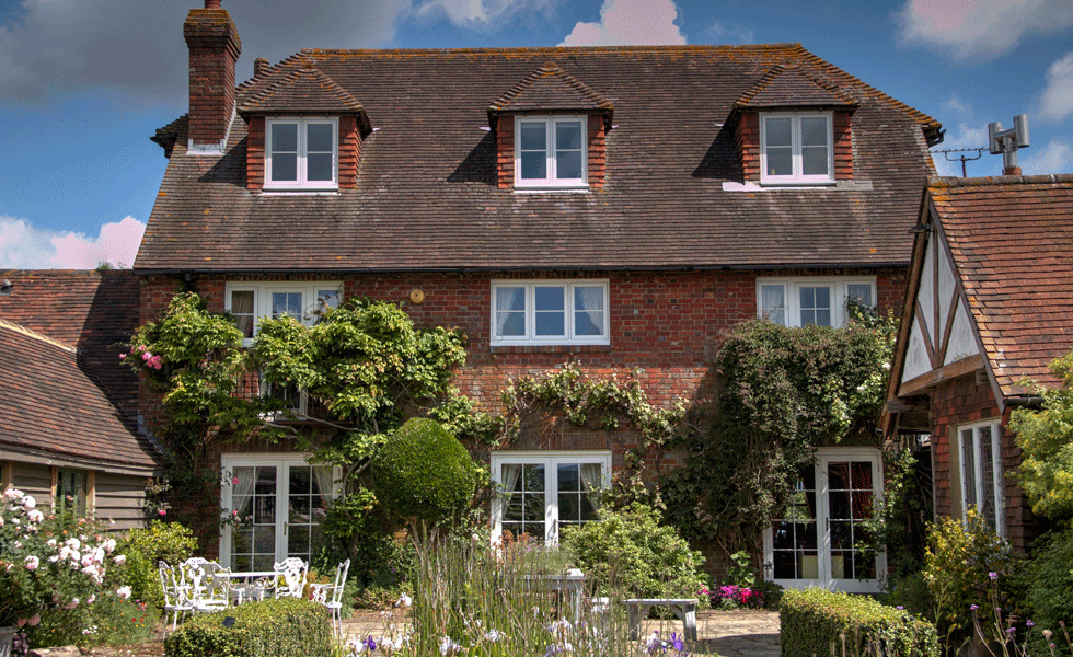 traditional house with matching window styles