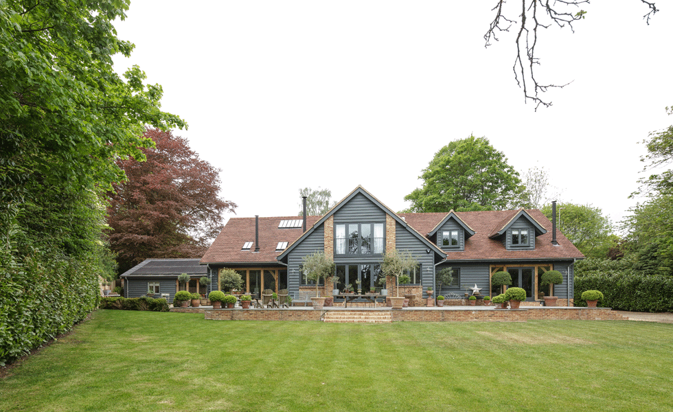 timber self build with dormer windows