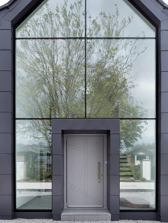 modern grey door with glazed glabel in new self build