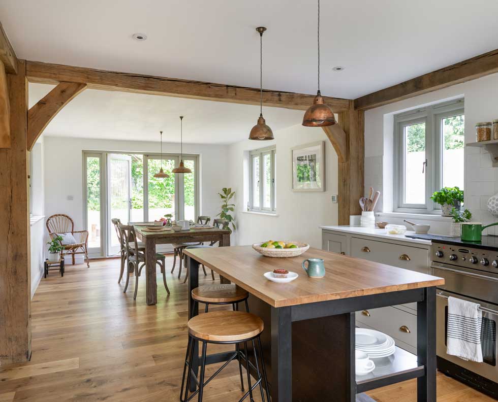 open plan kitchen diner with pendant lights