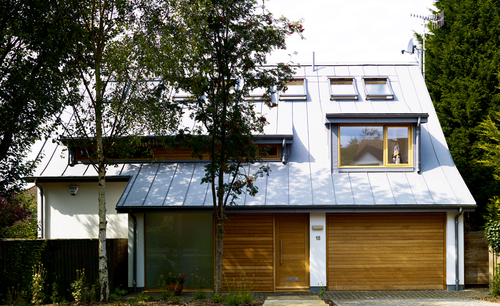 modern self build with zinc clad dormer window
