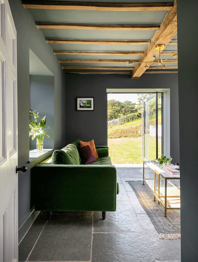 aluminium pivot door in cottage