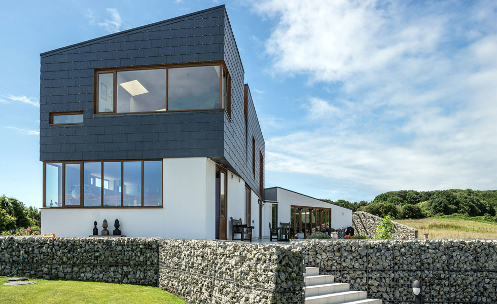 Contemporary house with slate and render