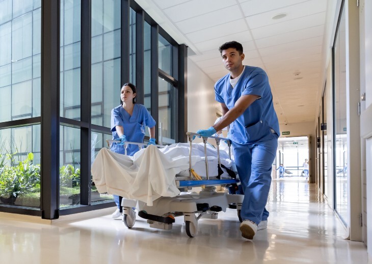 Doctors assisting patients at an hospital