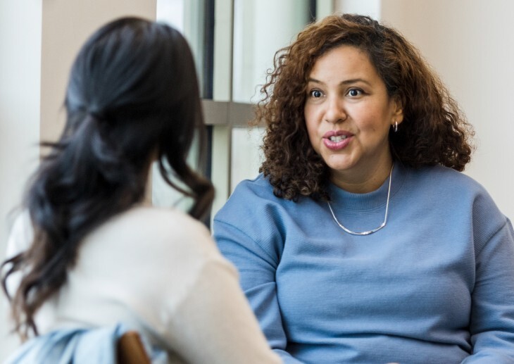 Two women in conversation