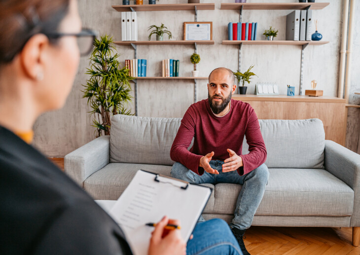 A man speaking to a therapist.