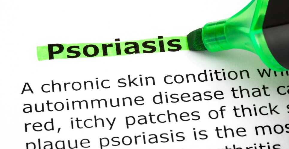 A section of a dictionary definition of psoriasis with a green highlighter highlighting the beginning to illustrate new research into the effectiveness and safety of adalimumab biosimilars in paediatric psoriasis