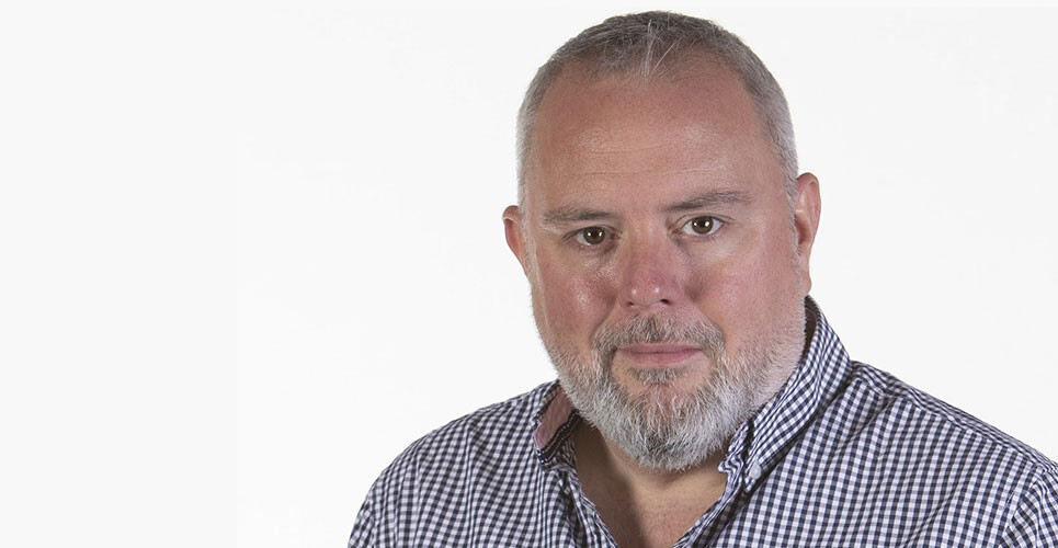 A headshot of Andrew Barton to illustrate his discussion of IV therapy complications