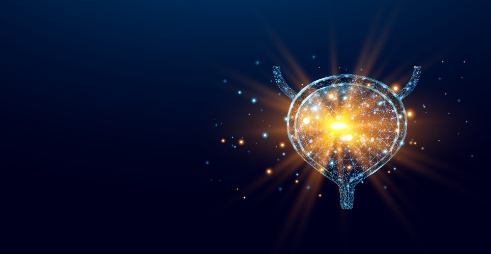A digital illustration of a wireframe bladder with a glowing, bright yellow core and yellow, orange, white and blue particles spreading out onto the dark blue background to illustrate a breakthrough metastatic bladder cancer combination therapy approved by NICE.