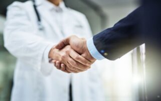 Doctor and practice manager partner