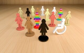 Human figures in different colours and patterns representing diversity