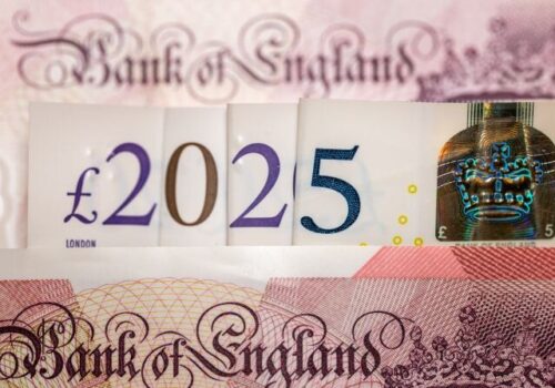 2025 in British pounds. UK banknotes arranged in date 2025, Concept, financial cuts to ICBs