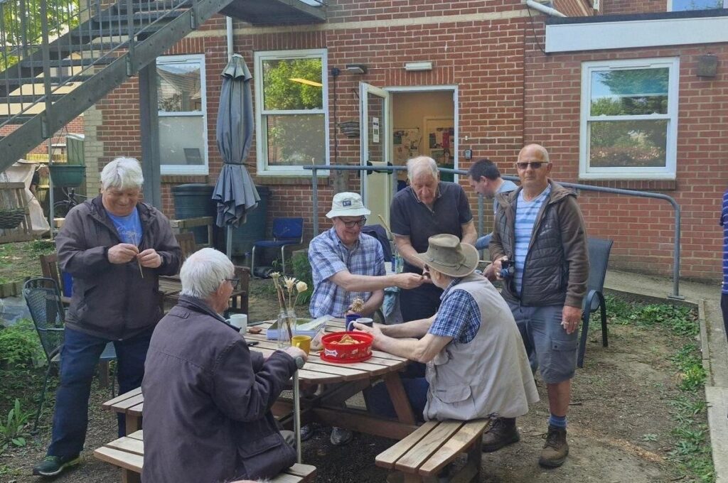 men gathered at outside space