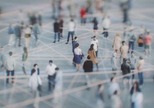 Lots of people on a street connected with lines