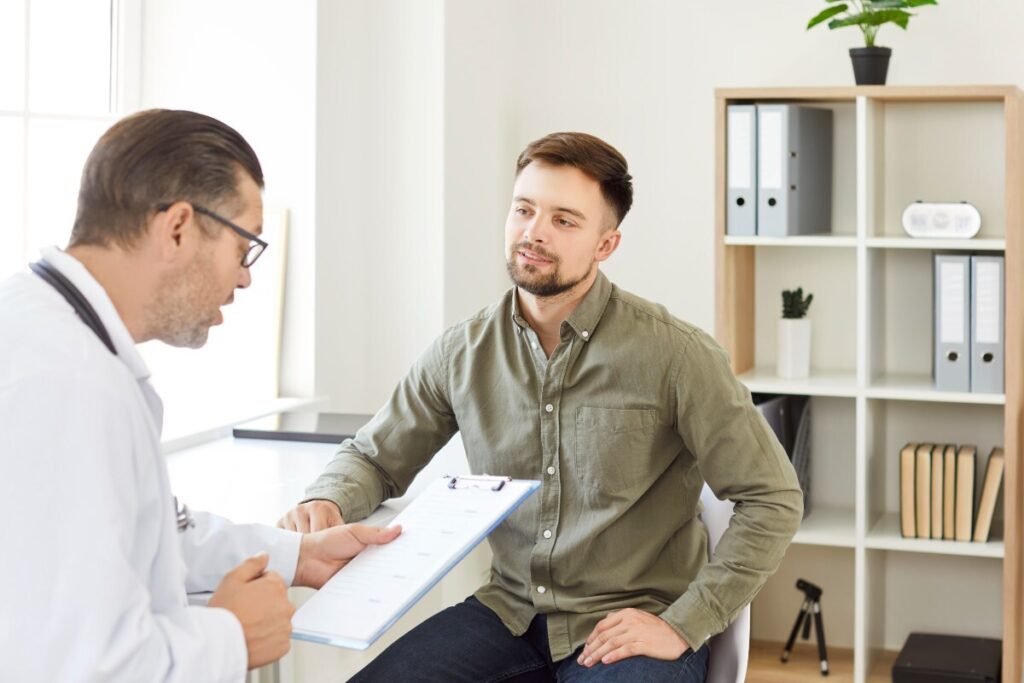 A GP speaking with a patient.