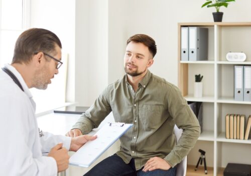 A GP speaking with a patient.