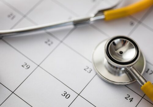 A stethoscope on a calendar