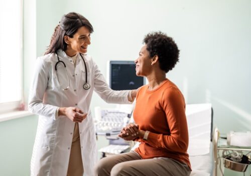 A GP speaking with a patient.