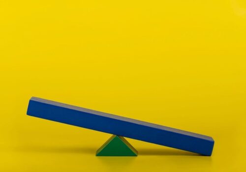 balance board on yellow background