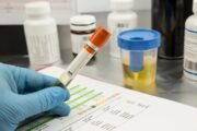 How should you manage this elderly woman with recurrent UTIs?