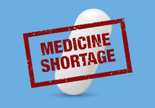 medicine shortage logo - tablet with a 'medicine shortage' stamp on top