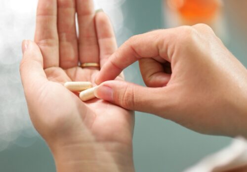 tablets in the palm of a hand