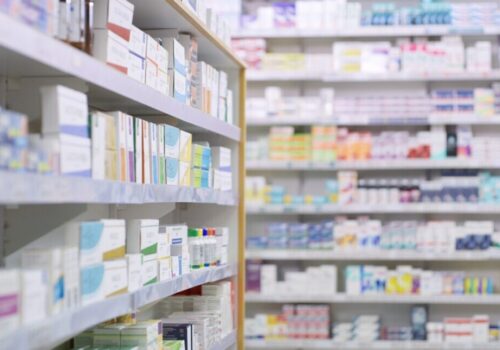 medicines on shelves in a pharmacy