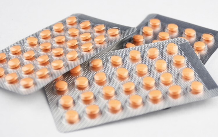 Three packets of medication