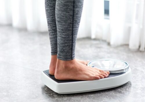 Someone standing on weighing scales