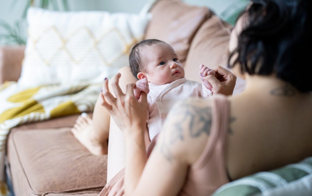 woman holding baby