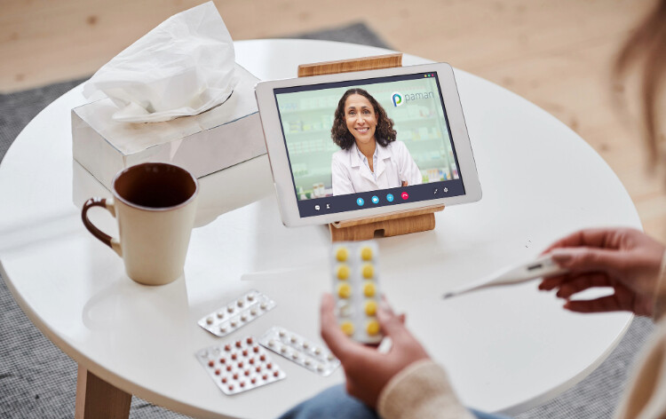 Someone taking medication with the support of the PAMAN technology