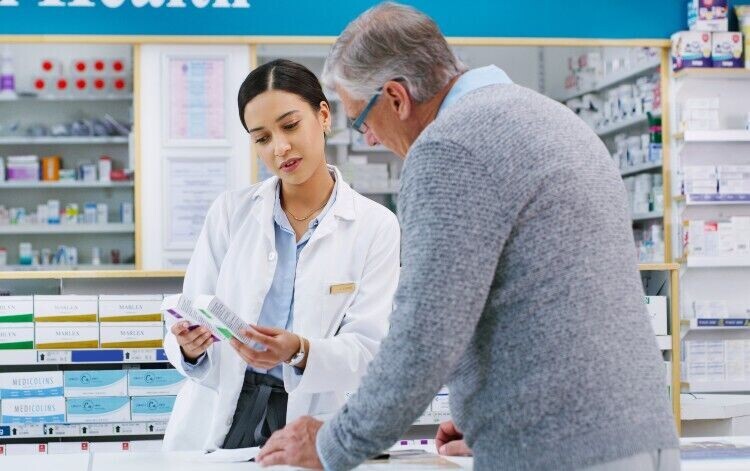 Pharmacist talking to patient