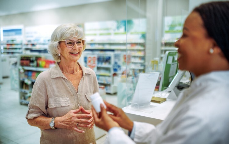 elderly person in a pharmacy