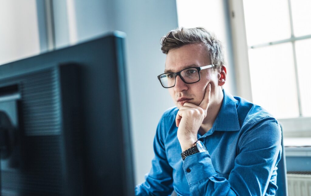 practice pharmacist looking at computer