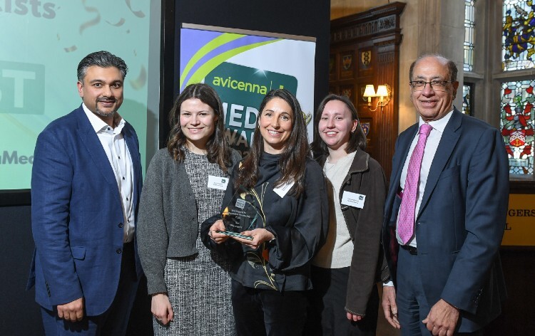 The Pharmacist team collecting their award