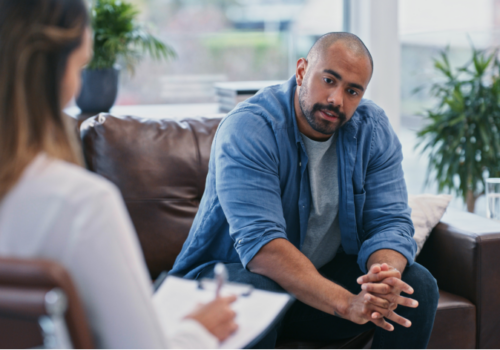Man speaking to therapist