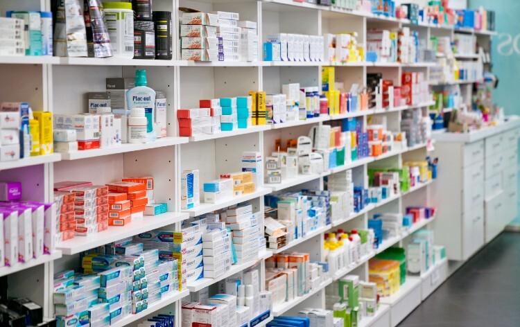 Shelves with medicaments in pharmacy