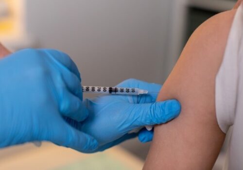 Someone getting vaccinated