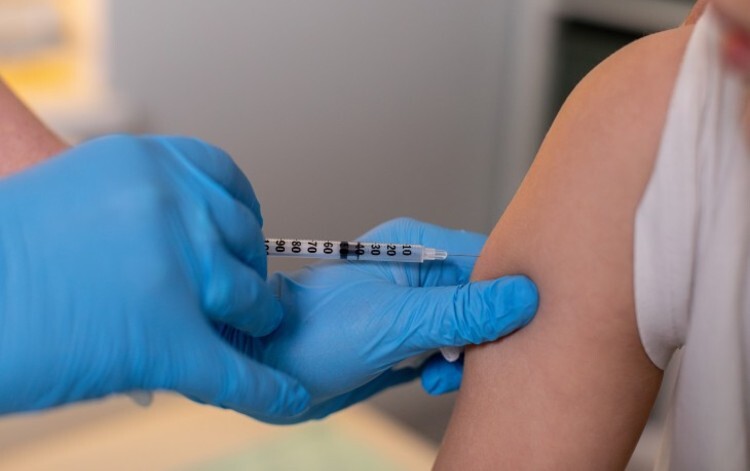 Someone getting vaccinated
