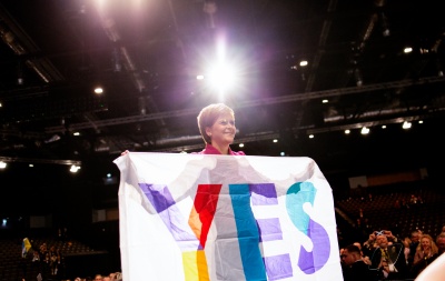 Nicola Sturgeon holding a Yes flag