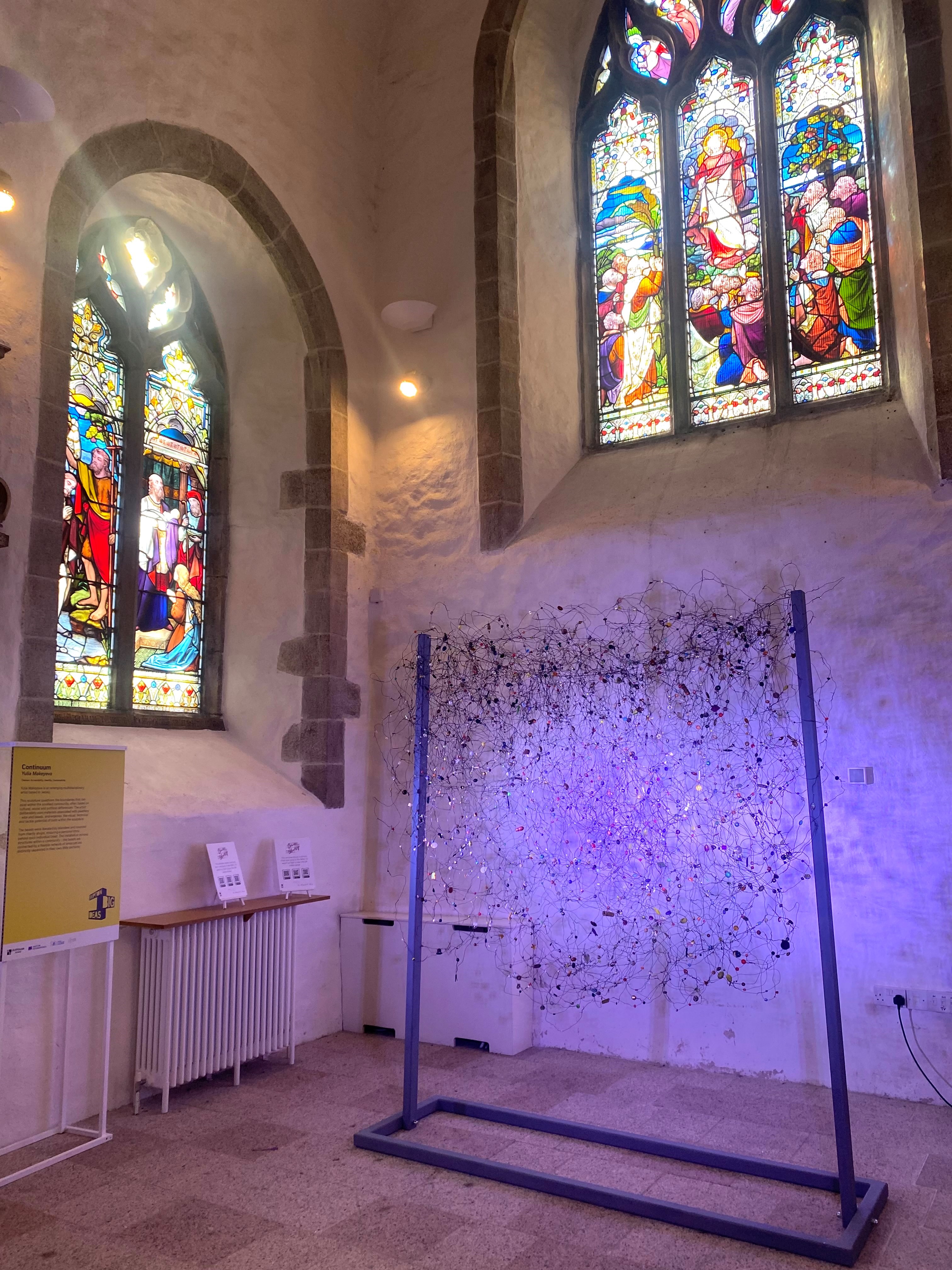 An artist's work inside St. Thomas' Church in St. Helier.