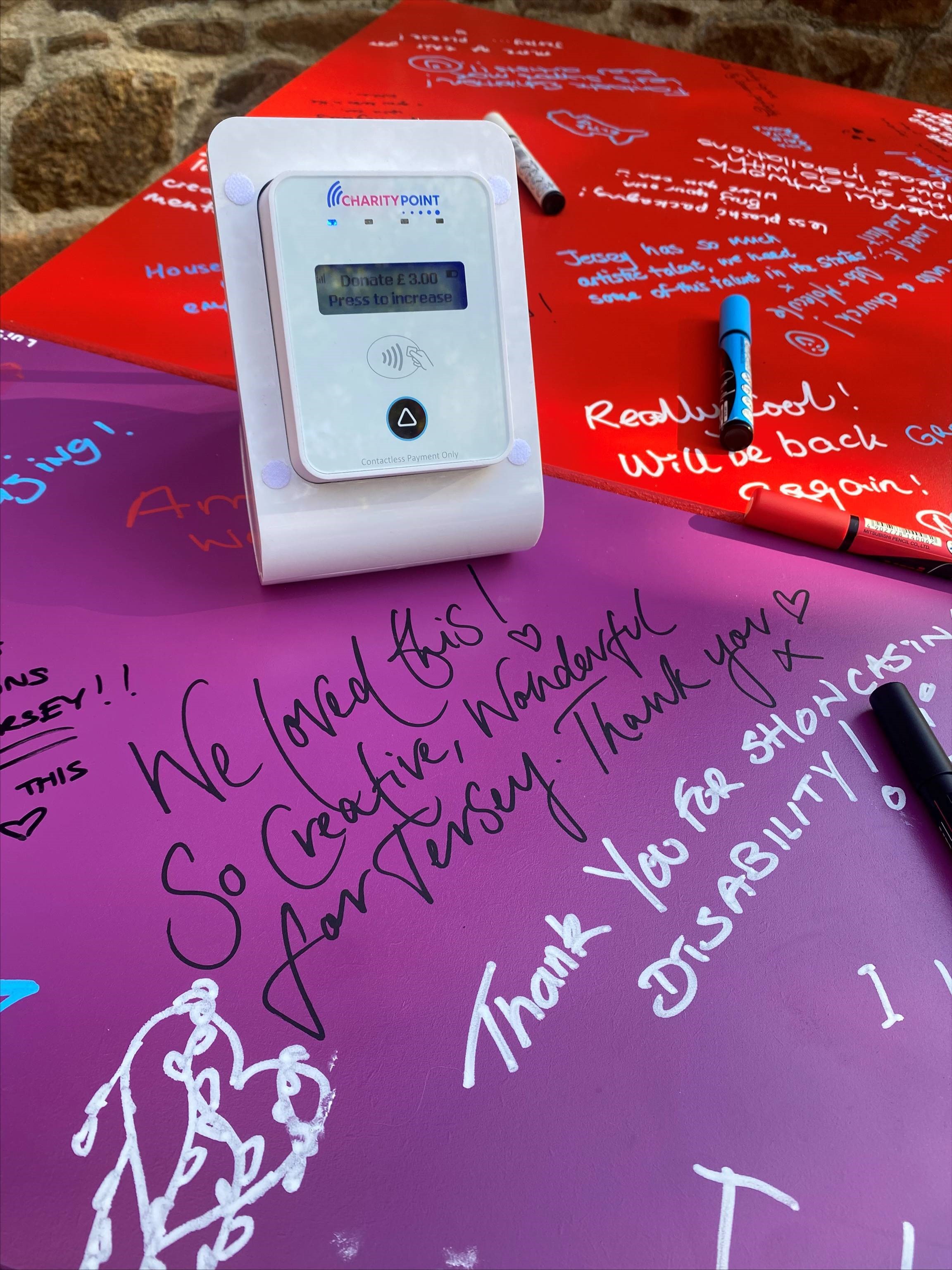 Visitors leave comments on the exhibition.